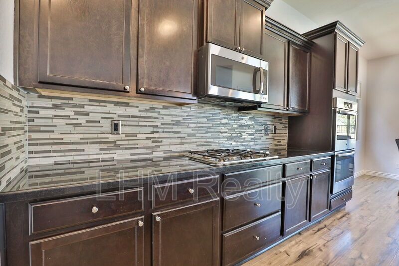 *Coming Soon* Luxurious 4 Bedroom Home with Pool, Fireplace, and Wine Cooler in Peoria, AZ property image